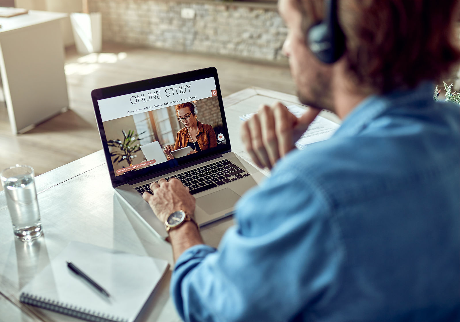 Learner choosing an online study program on a laptop